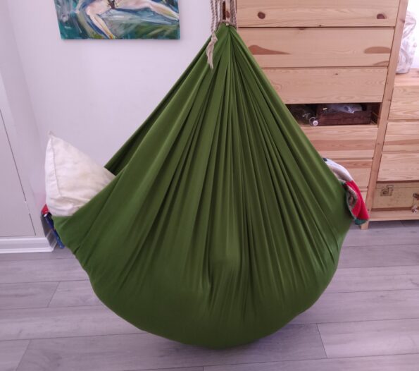 A den created in a green hammock